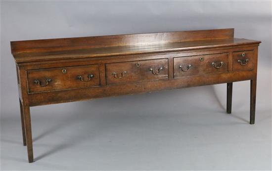 A George III oak dresser base, W.7ft 8in. D.1ft 7in. H.3ft 2in.